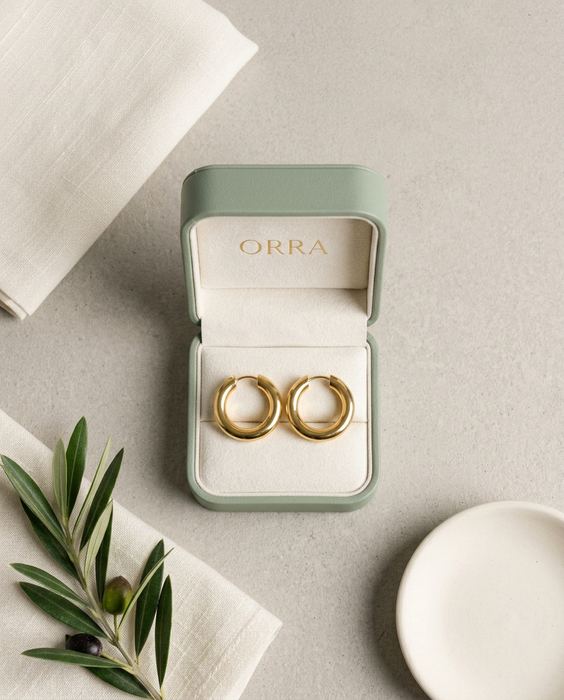 ORRA concept brand, gold hoop earrings: Style — the brand's palette