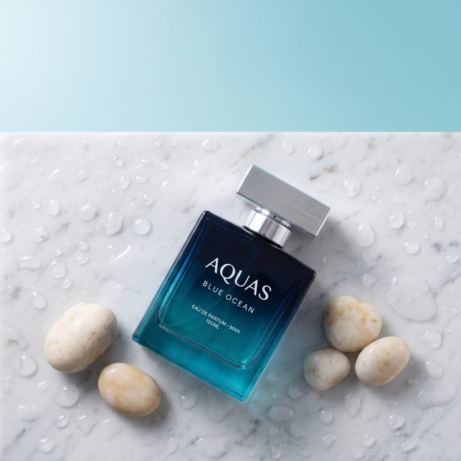 AI generated product photography for Aquas Blue Ocean fragrance brand — bathroom counter scene