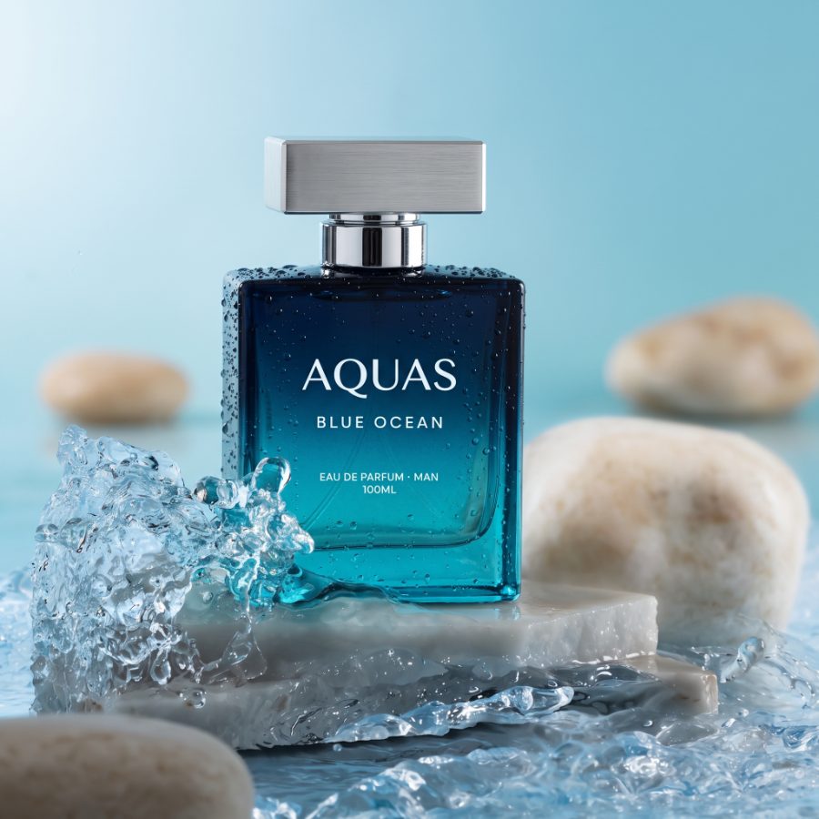 AI generated product photography for Aquas Blue Ocean fragrance brand — crown splash shot