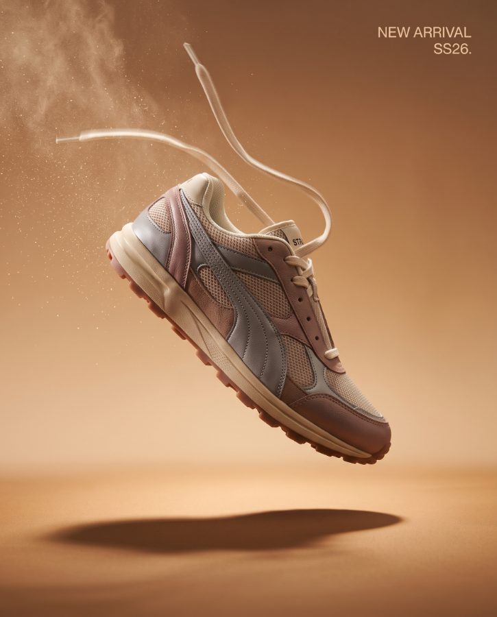 AI generated footwear ad concept for Strata Trail 02 sneaker brand — e-commerce pair shot